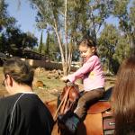 Paige & Kaylin riding Kisses with Grandma Carla