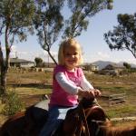 Paige & Kaylin riding Kisses with Grandma Carla