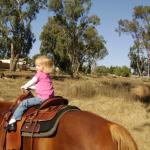 Paige & Kaylin riding Kisses with Grandma Carla