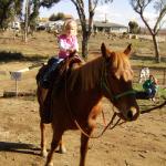 Paige & Kaylin riding Kisses with Grandma Carla